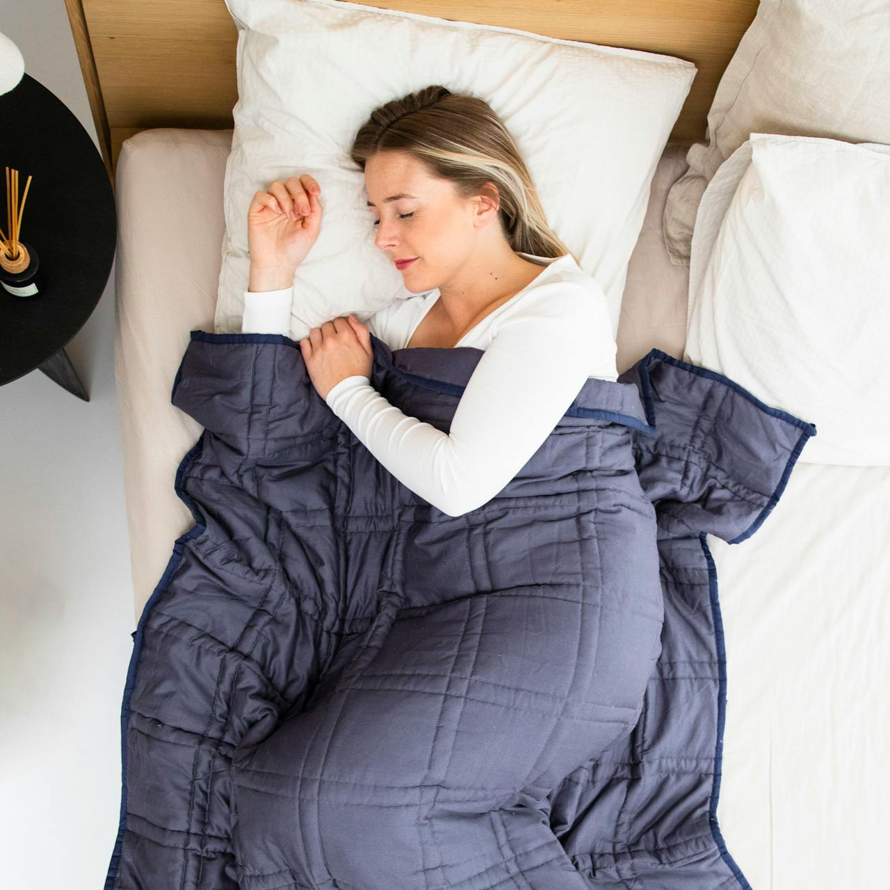 girl-smiling-while-sleeping