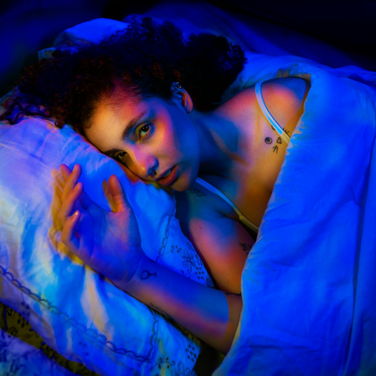 girl-in-bed-trying-to-sleep